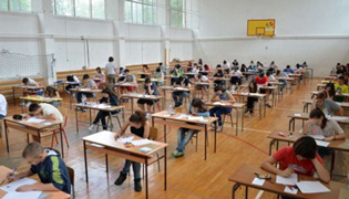 TAKING OF THE PRIMARY SCHOOL LEAVING EXAM IN PROGRESS