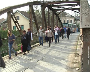 ACROSS THE BRIDGE ONLY ON FOOT