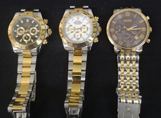 A CAR FULL OF GOLD JEWELRY AND SUSPICIOUS WRIST-WATCHES