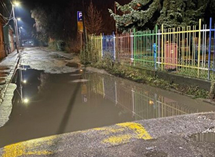 STREET NEAR KINDERGARTEN FLOODED AGAIN