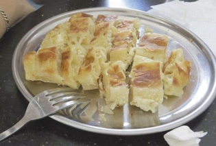 BAKED FILLED PASTRY THAT CONNECTS SERBS, ALBANIANS AND ROMA