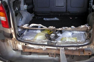 SMUGGLING NEARLY 14 KILOGRAMS OF MARIJUANA