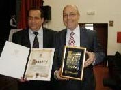 GOLDEN PLAQUE OF THE MUNICIPALITY OF MEDVEDJA PRESENTED TO MINISTER MILAN MARKOVIC, PRESIDENT OF THE COORDINATION BODY